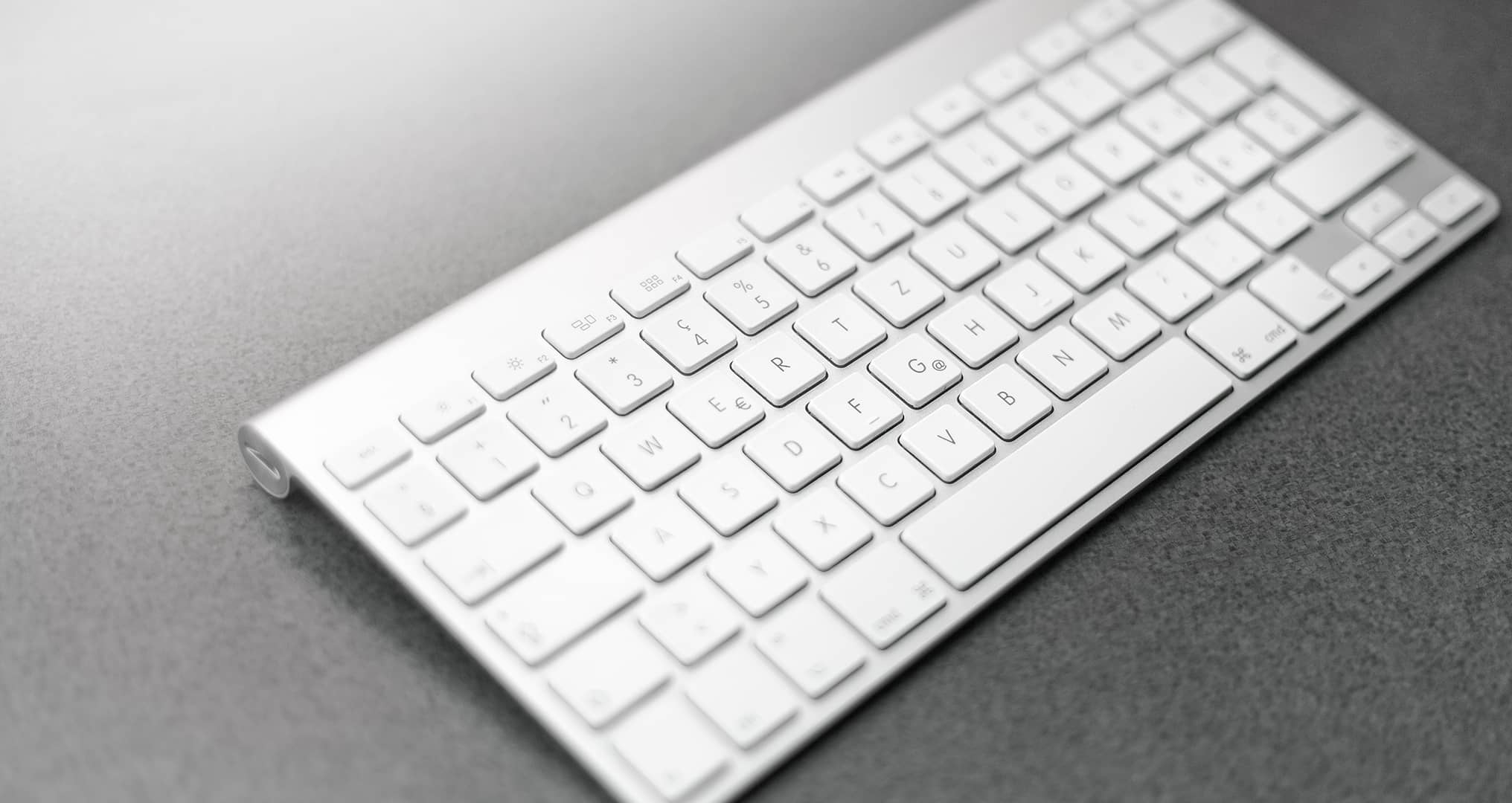 apple keyboard on desk